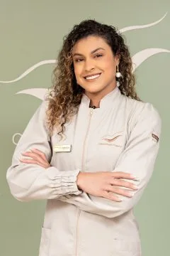 Dra. Amanda Alves de Oliveira, diretora clínica e avaliadora, no ensaio da equipe da Odontologia Premier